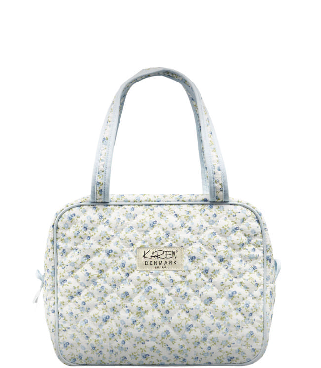 Karen stor toilettaske med hank i blåt småblomstret quilt